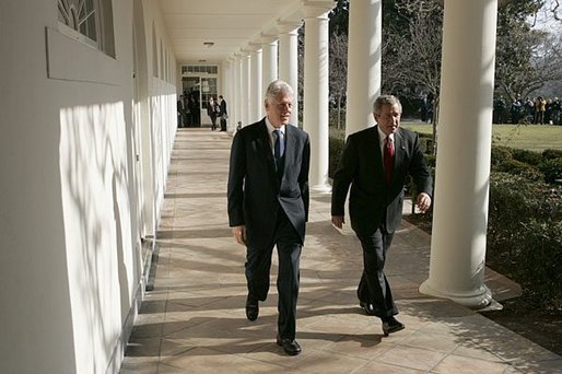 President George W. Bush walks with former President Bill Clinton along the colonnade at the White House Monday, Jan. 3, 2005. Former Presidents Clinton and George H.W. Bush are leading a nationwide charitable fundraising to aid victims of last week's earthquake and tsunamis in South Asia. White House photo by Susan Sterner.