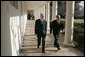 President George W. Bush walks with former President Bill Clinton along the colonnade at the White House Monday, Jan. 3, 2005. Former Presidents Clinton and George H.W. Bush are leading a nationwide charitable fundraising to aid victims of last week's earthquake and tsunamis in South Asia. White House photo by Susan Sterner.