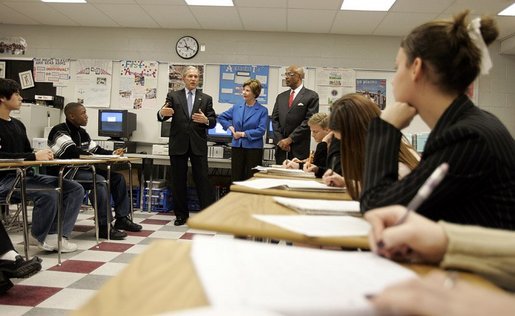 President George W. Bush, Mrs. Laura Bush and Secretary of Education Rod Paige talk to international baccalaureate program students of J.E.B. Stuart High School in Falls Church, VA on January 12, 2005. White House photo by Paul Morse