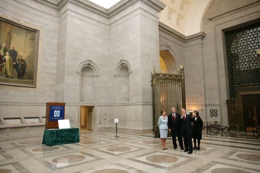 President George W. Bush and Laura Bush tour of the National Archives in Washington, D.C., with National Archivist John Carlin, second on right, and Senior Curator Stacy Bredhoff, right, Wednesday, Jan. 19, 2005. During their tour, President Bush and Mrs. Bush viewed the U.S. Constitution, the Bill of Rights, George Washington's first inaugural address, and the Declaration of Independence. White House photo by Eric Draper