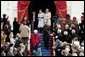 Former President George H. W. Bush and former First Lady Barbara Bush lead Jenna Welch, Barbara Bush and Jenna Bush to their seats to watch the swearing-in ceremony of President George W. Bush at the U.S. Capitol, Jan. 20, 2005. White House photo by Paul Morse