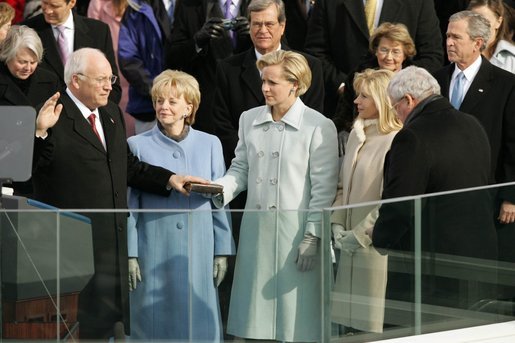 Dick Cheney is sworn in for a second term as Vice President by Speaker of the House of Representatives Dennis Hastert during an inaugural ceremony Thursday, Jan. 20, 2005. Lynne Cheney, Mary Cheney, and Liz Cheney listen as he takes the oath of office at the U.S. Capitol. White House photo by Susan Sterner