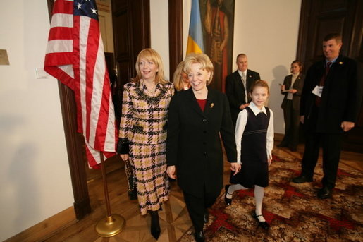 Lynne Cheney walks with Mrs. Viktor Yushchenko during a meeting in Krakow, Poland, Jan. 26, 2005. White House photo by David Bohrer