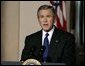 President George W. Bush delivers a live televised statement on Iraq's elections from the Cross Hall of the White House, Sunday, Jan. 30, 2005. White House photo by Eric Draper