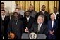 President George W. Bush congratulates the Detroit Pistons on winning the 2004 NBA Championship during a ceremony in the East Room of the White House, Monday, Jan. 31, 2005. White House photo by Paul Morse.