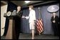 President George W. Bush congratulates Margaret Spellings, the new Secretary of Education, during her swearing-in ceremony at the Department of Education in Washington, D.C., Monday, Jan. 31, 2005. Also pictured, right, is Secretary Spellings husband, Robert Spellings. White House photo by Paul Morse.