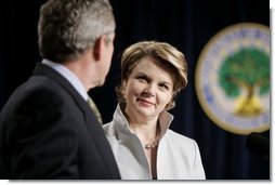 Margaret Spellings listens as President George W. Bush introduces her as the new Secretary of Education during a swearing-in ceremony at the Department of Education in Washington, D.C., Monday, Jan. 31, 2005.  White House photo by Paul Morse