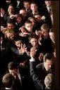 President George W. Bush waves to a crowd of Congressional Pages after delivering his fourth State of the Union Address at the U.S. Capitol, Wednesday, Feb. 2, 2005. White House photo by Paul Morse