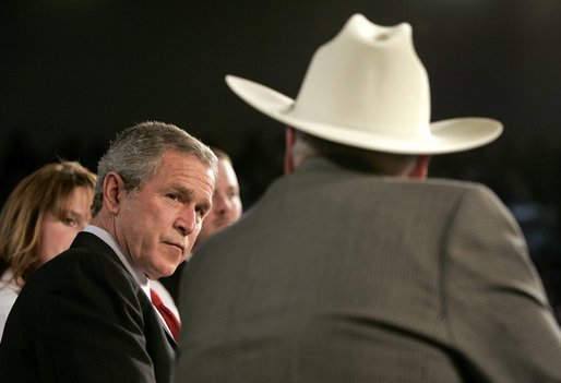 President George W. Bush listens to retired senior citizen Leo Keller during a Town Hall meeting about the strengthening of Social Security at the Montana ExpoPark in Great Falls, Mont., Thursday, Feb. 3, 2005. White House photo by Eric Draper