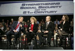 President George W. Bush talks with Mary Mornin, a secretary at St. Robert Bellarmine School in Omaha, Neb., Jerry Rempe, quality assurance manager at Omaha Steaks, and Amanda Temoshek, owner of Heartland Campaign Management, during a conversation on strengthening Social Security in Omaha, Neb., Friday, Feb. 4, 2005.  White House photo by Eric Draper