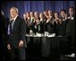 President George W. Bush receives applause during his introduction at the Detroit Economic Club in Detroit, Michigan, Tuesday, Feb. 8, 2005. White House photo by Eric Draper