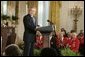 President George W. Bush speaks during a ceremony honoring African American History Month Tuesday, Feb. 8, 2005. "In the 1920s, Dr. Woodson argued that if African Americans were to take their rightful place in society, young Americans of all races needed to learn about the black contribution to our history and culture. So in 1926, he launched the first black history week. Today, a movement that began in black churches and schoolrooms is observed all across America -- including the White House. Welcome," said the President. White House photo by Paul Morse