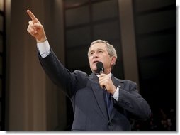 President George W. Bush acknowledges members of the audience during his Town Hall meeting on strengthening Social Security in Raleigh, N.C., Thursday, Feb. 10, 2005.  White House photo by Eric Draper