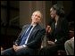 President George W. Bush and Dawn Baldwin, an English teacher at Lenior Community College in Kinston, N.C., exchange smiles during a town hall meeting on strengthening Social Security in Raleigh, N.C., Thursday, Feb. 10, 2005. White House photo by Eric Draper