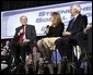 President George W. Bush shares a laugh with stage participants Frank Partin, right, and his daughter Amy during a Conversation on Strengthening Social Security at the Pease International Tradeport Airport, Wednesday, Feb. 16, 2005. White House photo by Eric Draper