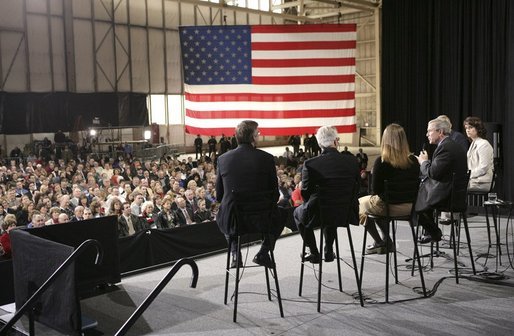 President George W. Bush joins stage participants during a Conversation on Strengthening Social Security at the Pease International Tradeport Airport, Wednesday, Feb. 16, 2005. White House photo by Eric Draper