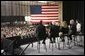 President George W. Bush joins stage participants during a Conversation on Strengthening Social Security at the Pease International Tradeport Airport, Wednesday, Feb. 16, 2005. White House photo by Eric Draper