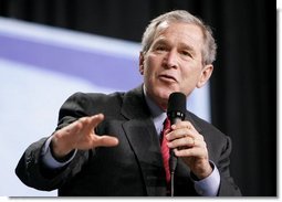 President George W. Bush leads the discussion on stage during a Conversation on Strengthening Social Security at the Pease International Tradeport Airport, Wednesday, Feb. 16, 2005.  White House photo by Eric Draper