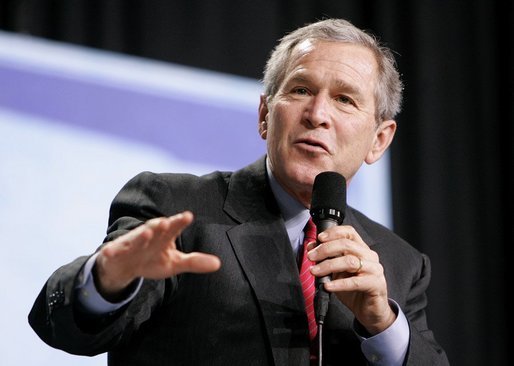 President George W. Bush leads the discussion on stage during a Conversation on Strengthening Social Security at the Pease International Tradeport Airport, Wednesday, Feb. 16, 2005. White House photo by Eric Draper