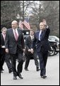 President George W. Bush walks with Ambassador John Negroponte, his nomination for the nation's first Director of National Intelligence, just outside the West Wing of the White House Thursday, Feb. 17, 2005. White House photo by Eric Draper