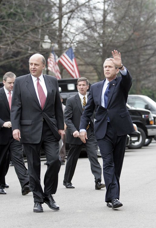 President George W. Bush walks with Ambassador John Negroponte, his nomination for the nation's first Director of National Intelligence, just outside the West Wing of the White House Thursday, Feb. 17, 2005. White House photo by Eric Draper