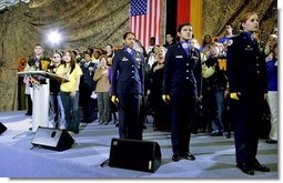 Students of General H. H. Arnold High School lead Mrs. Bush and the audience in the Pledge of Allegiance prior to her remarks Tuesday, Feb. 22, 2005, in Wiesbaden, Germany.   White House photo by Susan Sterner