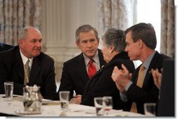 President George W. Bush talks with Governor Ruth Ann Minner, D-Del., during a meeting with the National Governors Association at the White House Monday, Feb. 28, 2005.  White House photo by Eric Draper