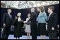 President George W. Bush watches as U.S. Supreme Court Justice Sandra Day O’Connor swears in Michael Chertoff as Secretary of Homeland Security during a ceremony Thursday, Mar. 3, 2005, at the Ronald Reagan Building and International Trade Center in Washington, D.C. On stage with Mr. Chertoff is his wife Meryl, center, and their two children Philip and Emily. White House photo by Paul Morse