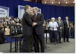 President George W. Bush greets Jon Paul Surma after a conversation on strengthening Social Security on the University of Notre Dame campus in South Bend, Indiana on Friday, March 4, 2005.  White House photo by Paul Morse