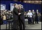 President George W. Bush greets Jon Paul Surma after a conversation on strengthening Social Security on the University of Notre Dame campus in South Bend, Indiana on Friday, March 4, 2005. White House photo by Paul Morse