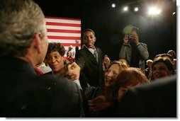 President George W. Bush greets the audience at the Community College of Allegheny County in Pittsburgh Monday, March 7, 2005.  White House photo by Susan Sterner