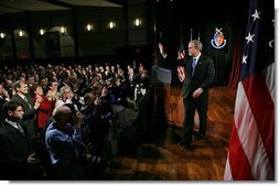 After delivering remarks about the War on Terror, President George W. Bush departs the National Defense University at Fort Lesley J. McNair in Washington, D.C., Tuesday, March 8, 2005.  White House photo by Eric Draper