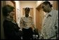 Laura Bush speaks with Kenyatta "Ken" Thigpen, his girlfriend Jewell Reed and their three-year-old son, Kevion, during a visit to the Rosalie Manor Community and Family Services center in Milwaukee, Wis., Tuesday, March 8, 2005. Mrs. Bush credits a New York Times article by Jason DeParle about Mr. Thigpen's determination to be a responsible father with bringing her attention to the needs of boys and young men. White House photo by Susan Sterner