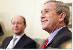 President George W. Bush and Romanian President Traian Basescu address the press in the Oval Office Wednesday, March 9, 2005.  White House photo by Paul Morse