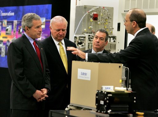 President George W. Bush looks at a prototype for a fuel cell auxiliary power unit for the Bradley A3 fighting vehicle during a tour of the technology company, "Battelle," with Energy Secretary Sam Bodman, left, vice president Bill Madia, center, and vice president Henry Cialone in Columbus, Ohio, Wednesday, March 9, 2005. White House photo by Krisanne Johnson