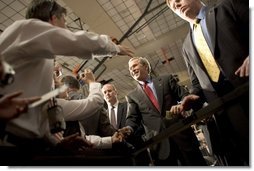 President George W. Bush greets the crowd at Auburn University at Montgomery in Montgomery, Alabama after talking about Social Security reform on Thursday March 10, 2005.   White House photo by Paul Morse