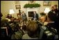 President George W. Bush and His Majesty King Abdullah of Jordan meet with reporters in the Oval Office Tuesday, March 15, 2004. White House photo by Paul Morse