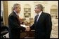 President George W. Bush welcomes Deputy Secretary of Defense Paul Wolfowitz to the Oval Office Wednesday, March 16, 2005. President Bush is recommending Secretary Wolfowitz to be elected as the next President of the World Bank. White House photo by Paul Morse