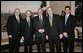 During St. Patrick's Day celebrations at the White House, President George W. Bush stands with, from left, Irish Prime Minister Bertie Ahern; British Ambassador Sir David Manning; British Secretary of State for Northern Ireland Paul Murphy; and U.S. Special Envoy for Northern Ireland Mitchell Reiss in the Diplomatic Reception Room Thursday, March 17, 2005. White House photo by Eric Draper