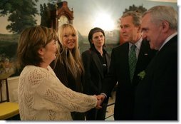 The fiancée and two sisters of Robert McCartney, a Catholic man who was killed in January, meet with President George W. Bush and Irish Prime Minister Bertie Ahern in the Diplomatic Reception Room at the White House Thursday, March 17, 2005. From left, they are: sister Paula Arnold; fiancée Bridgeen Hagans; sister Catherine McCartney; and Irish Prime Minister Bertie Ahern.  White House photo by Eric Draper