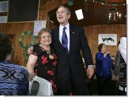 President George W. Bush visits with retirees at The Life Project Senior Development Center in Orlando, Fla., Friday March 18, 2005.  White House photo by Eric Draper