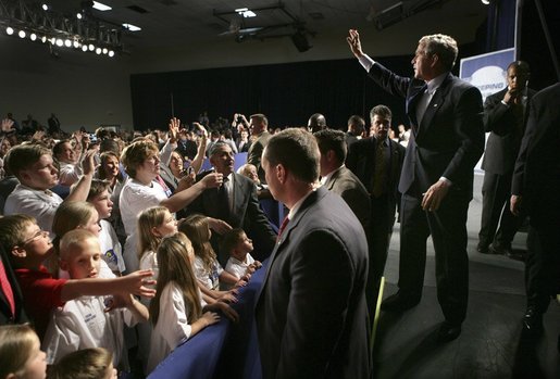 President George W. Bush waves to the crowd during a visit to Lake Nona YMCA Family Center in Orlando, Fla., Friday, March 18, 2005. White House photo by Eric Draper