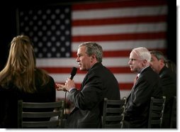 President George W. Bush leads the discussion with participants at the Wings Over the Rockies Air and Space Museum Monday, March 21, 2005. The Denver ‘Conversation on Strengthening Social Security’ was the last of the day in the president’s travels.  White House photo by Eric Draper