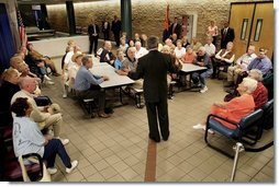 President George W. Bush talks about Social Security issues with a group of seniors Monday, March 21, 2005, at the Morris K. Udall Center in Tucson, Ariz. The recreation center was the president’s first stop on his Arizona visit.  White House photo by Eric Draper