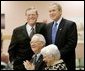 President George W. Bush and Senator Pete Domenici, R-NM., visit with breakfast guests at Bear Canyon Senior Center, Tuesday, March 22, 2005, in Albuquerque. The two visited with more than 30 seniors who were on hand to hear the president’s proposals for Social Security reform. White House photo by Eric Draper