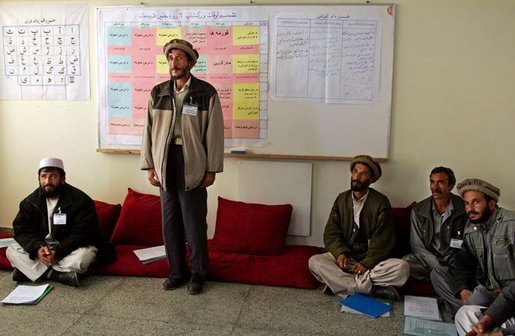 A man studying to be a teacher stands to introduce himself during a visit by Mrs. Bush to Kabul University in Kabul, Afghanistan, Wednesday, March 30, 2005. White House photo by Susan Sterner