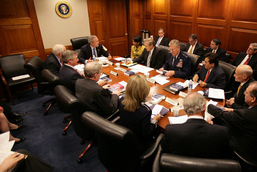 President George W. Bush meets with members of his national security team Thursday, March 31, 2005, at the White House to discuss the findings of the Commission on the Intelligence Capablities of the United States regarding Weapons of Mass Destruction. The 13-chapter report to the President was released Thursday. White House photo by Eric Draper