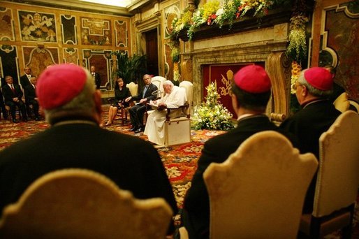 The President and Mrs. Bush listen to statements made by Pope John Paul II during their June 2004 visit to Rome. White House photo by Eric Draper