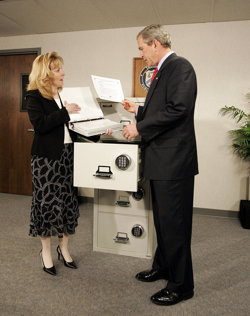 President George W. Bush tours the Treasury Agency's Bureau of Public Debt, with Director Susan Chapman, in Parkersburg, W.Va., Tuesday, April 5, 2005. White House photo by Paul Morse