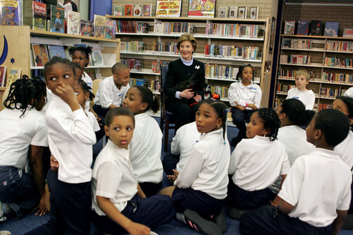 In celebration of National Library Week, Laura Bush visits the Martin Luther King Jr. Memorial Library and talks with fourth-graders from Maury Elementary School in Washington, D.C., Tuesday, April 12, 2005. During her visit to the library, Mrs. Bush read Oliver Butterworth's "The Enormous Egg" and introduced her Scottish Terrier Miss. Beazley to the students. White House photo by Krisanne Johnson